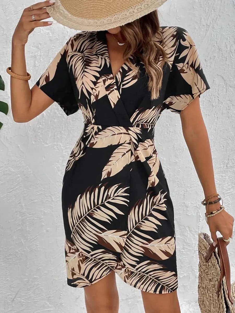 Jurk met tropische print en vleermuismouwen M