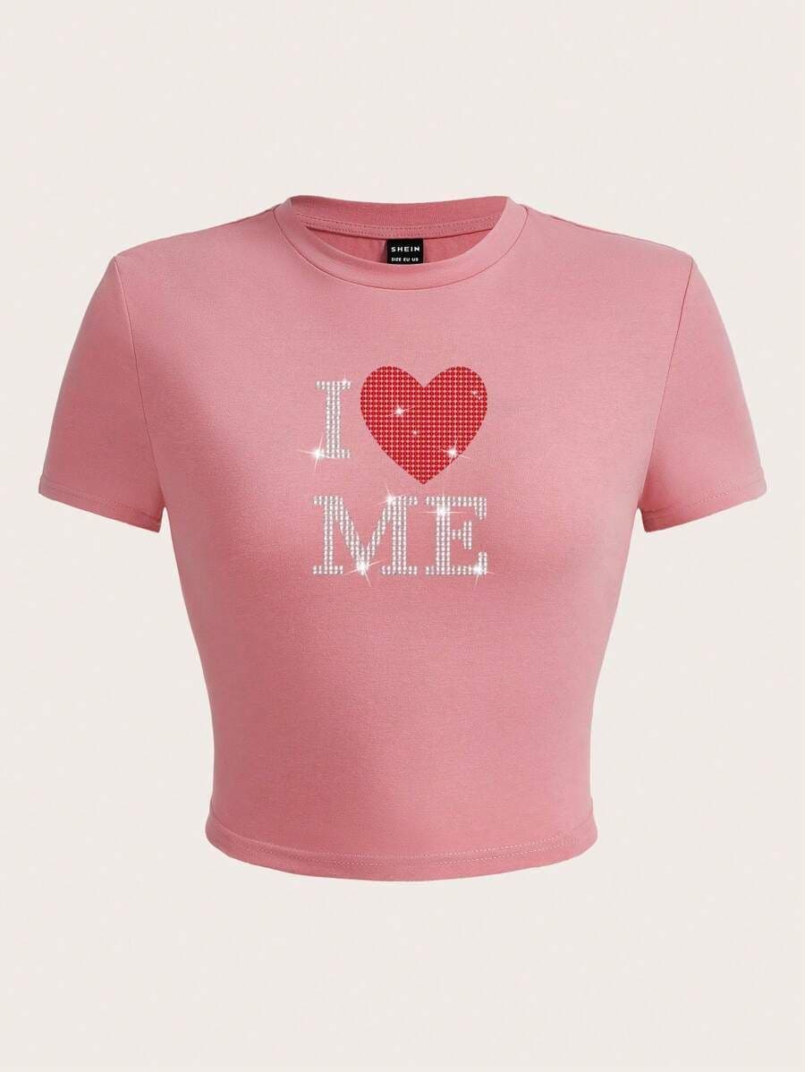 Shirt met strass hart en sloganpatroon XL