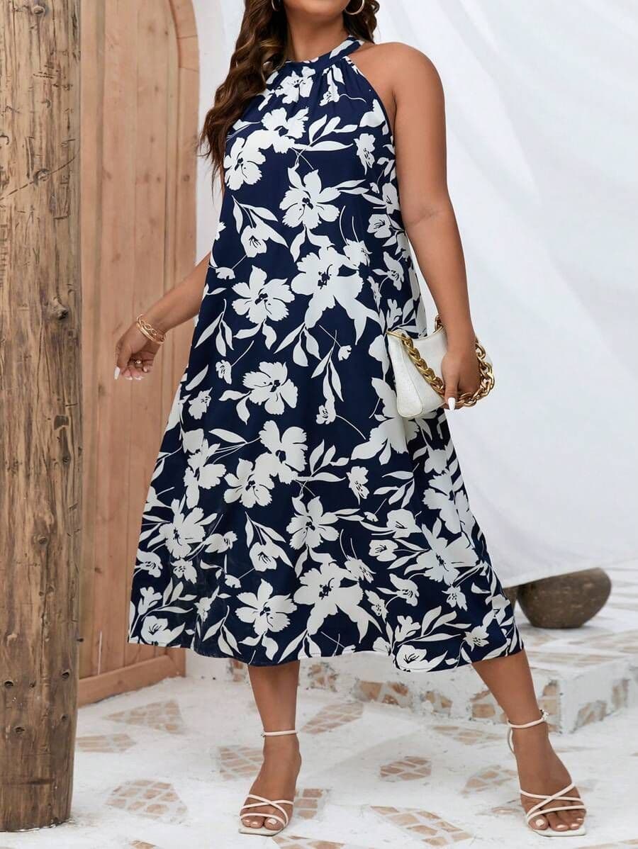Lune plus halterjurk met bloemenprint