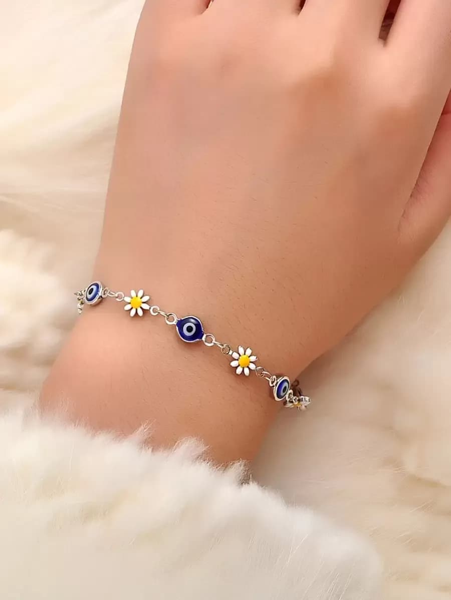 Boze oog en bloem decor armband koperen sieraden